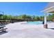 Community swimming pool featuring lounge chairs and a playground in the background at 547 Historic Dr, Hillsborough, NC 27278