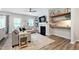 Inviting living room featuring a fireplace, plush sofa, and stylish decor at 594 Historic Dr, Hillsborough, NC 27278