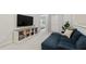 Upstairs loft featuring a TV, shelving, and lots of space at 594 Historic Dr, Hillsborough, NC 27278