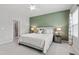 Serene main bedroom featuring a calming color palette and plush bedding at 594 Historic Dr, Hillsborough, NC 27278