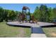 Community playground with mulch ground, providing a safe play area at 594 Historic Dr, Hillsborough, NC 27278