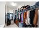 Spacious walk-in closet with ample storage and a clothing organization system at 594 Historic Dr, Hillsborough, NC 27278
