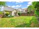 Inviting backyard with lush lawn and patio, great for entertaining or relaxing at 607 Millbrook Dr, Pittsboro, NC 27312