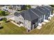 Aerial view showing the layout of the townhomes with lawns at 608 Creekway Dr, Fuquay Varina, NC 27526