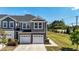 Beautiful townhome with a two-car garage and well-manicured landscaping, offering a welcoming curb appeal at 608 Creekway Dr, Fuquay Varina, NC 27526