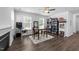 Spacious living room featuring a fireplace, natural light, and tasteful decor, ideal for entertaining and relaxing at 608 Creekway Dr, Fuquay Varina, NC 27526