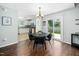 Bright dining area with sliding glass doors and an adjacent modern kitchen at 611 Edenberry Dr, Durham, NC 27713