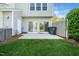 Backyard features a concrete patio, lawn, and the home's exterior at 614 Canyon Lake Cir, Morrisville, NC 27560