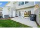 Backyard features a concrete patio, lawn, and the home's exterior at 614 Canyon Lake Cir, Morrisville, NC 27560