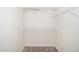 Walk-in closet with carpeted floors and built-in shelving at 614 Canyon Lake Cir, Morrisville, NC 27560