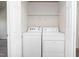 Laundry closet featuring a washer and dryer with overhead storage shelf at 614 Canyon Lake Cir, Morrisville, NC 27560