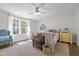 Cozy bedroom with natural light, complemented by neutral tones and carpeted floors at 626 Bailey Rd, Coats, NC 27521