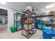 Organized storage area featuring shelving units and various storage containers at 626 Bailey Rd, Coats, NC 27521