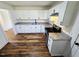 Well-designed kitchen with white cabinetry, granite countertops, and modern appliances, offering ample space at 710 Dothan Ave, Burlington, NC 27217