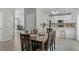 View of dining room and kitchen at 712 Wellspring Dr, Holly Springs, NC 27540