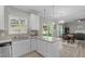 Bright kitchen with stainless appliances, granite counters and dining view at 712 Wellspring Dr, Holly Springs, NC 27540