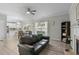 Open-concept living room with view to kitchen, dining area at 712 Wellspring Dr, Holly Springs, NC 27540