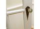 Close up of a traditional interior door featuring vintage hardware at 7129 Dexter Rd, Oxford, NC 27565