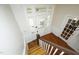 Bright foyer with hardwood floors, decorative door with window panes, and traditional staircase at 7129 Dexter Rd, Oxford, NC 27565