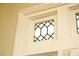 Close up of decorative glass panes in the door frame, showcasing the elegance and detail at 7129 Dexter Rd, Oxford, NC 27565