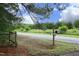 Mailbox showing the street number of the property with a wooded backdrop at 7129 Dexter Rd, Oxford, NC 27565