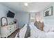 Comfortable bedroom showcasing a neutral color palette, stylish decor, and ample space for relaxation at 7698 Nc Highway 222, Kenly, NC 27542