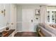Inviting foyer with a white front door, stylish console table and decor at 7698 Nc Highway 222, Kenly, NC 27542