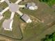 Aerial view of homes with tree-lined yards, offering a blend of nature and residential comfort at 80 Doonbeg Dr, Fuquay Varina, NC 27526