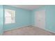 Comfortable bedroom featuring a closet, carpet, soft walls and a window for natural light at 80 Doonbeg Dr, Fuquay Varina, NC 27526