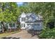 Two-story home with a well-maintained front lawn and a two car garage at 8012 Glenbrittle Way, Raleigh, NC 27615