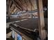 View of an attic featuring exposed wooden beams and ductwork, highlighting the home's infrastructure at 827 Sunset Ave, Rocky Mount, NC 27804