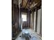 Unfinished bathroom with exposed studs and a new window at 827 Sunset Ave, Rocky Mount, NC 27804