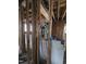 Interior view of an unfinished room featuring an open electrical panel and exposed wiring at 827 Sunset Ave, Rocky Mount, NC 27804