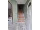 Welcoming entryway featuring a staircase and doorway, offering a glimpse into the home's layout at 827 Sunset Ave, Rocky Mount, NC 27804