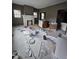 Living room under renovation featuring a fireplace, windows, and ample space at 827 Sunset Ave, Rocky Mount, NC 27804