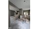 Living room under renovation featuring fresh paint, hardwood flooring, and ample space at 827 Sunset Ave, Rocky Mount, NC 27804
