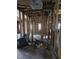 Unfinished living room with exposed framing, showcasing renovation potential and underlying structure at 827 Sunset Ave, Rocky Mount, NC 27804
