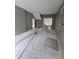 Empty room featuring fresh paint, hardwood flooring, with a window view to the exterior at 827 Sunset Ave, Rocky Mount, NC 27804