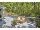 Enjoy outdoor living with a spacious deck and ample seating options at 8407 Millers Bnd, Bahama, NC 27503