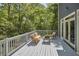 Inviting deck features comfortable furniture and views of the lush greenery at 8407 Millers Bnd, Bahama, NC 27503