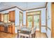 Dining Area with access to the back deck features wood trim and hardwood floors at 8407 Millers Bnd, Bahama, NC 27503