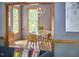 Dining room with views of the outdoors and a modern light fixture at 8407 Millers Bnd, Bahama, NC 27503