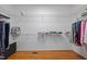 Organized walk-in closet with shelving and rods for clothing and storage at 910 S Third St, Mebane, NC 27302
