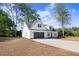 Beautiful home with a long drive leading up to the attached two car garage at 9200 Otter Ct, Middlesex, NC 27557