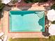 Aerial view of pool with patio and lounge seating at 102 Antler Point Rd, Chapel Hill, NC 27516