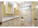 Elegant bathroom with marble vanity, walk-in shower and stylish tile flooring at 102 Antler Point Rd, Chapel Hill, NC 27516