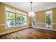 Bright dining room featuring natural light and hardwood floors at 102 Antler Point Rd, Chapel Hill, NC 27516