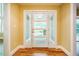 Inviting foyer with a stylish door and sidelights, leading into a bright and open home at 102 Antler Point Rd, Chapel Hill, NC 27516