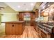 Updated kitchen with a center island, stainless steel appliances, and wood cabinets at 102 Antler Point Rd, Chapel Hill, NC 27516
