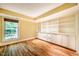 Bright office boasts custom built-ins, hardwood floors and large window with natural light at 102 Antler Point Rd, Chapel Hill, NC 27516